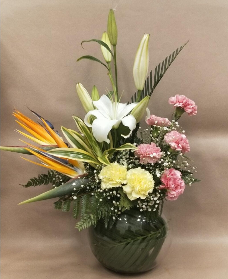 Floral Arrangement with Birds of Paradise, Oriental Lilies and Carnations in Fish Bowl