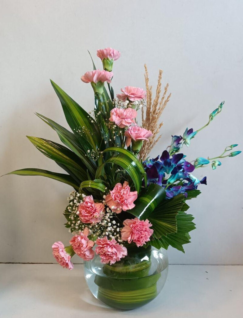 Floral Arrangement of Carnations and Orchids in Fish Bowl