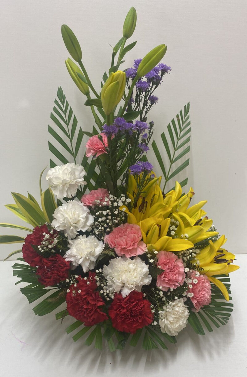 Flower Arrangement with Asiatic Lily and Carnations in Basket